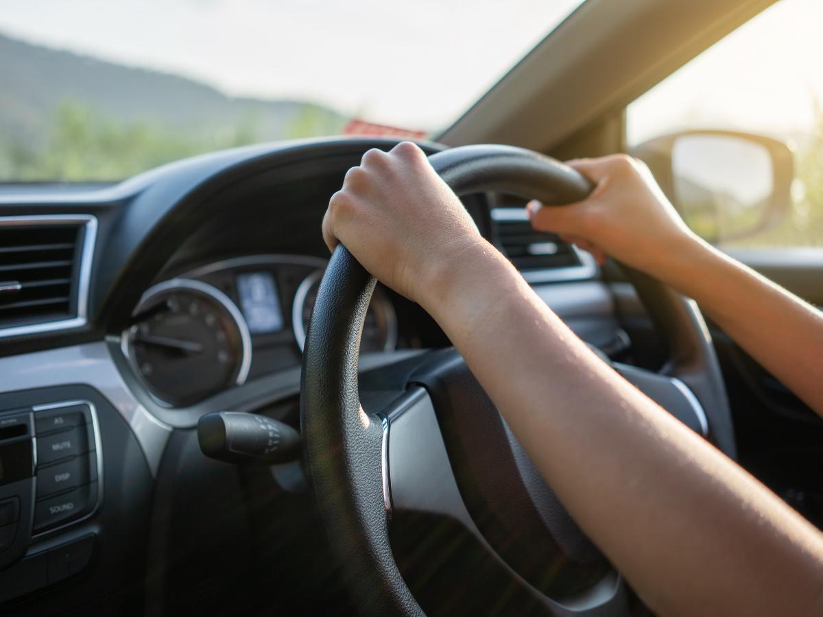 Driver hands on the steering wheel during a Hyundai test drive in Fayetteville, AR